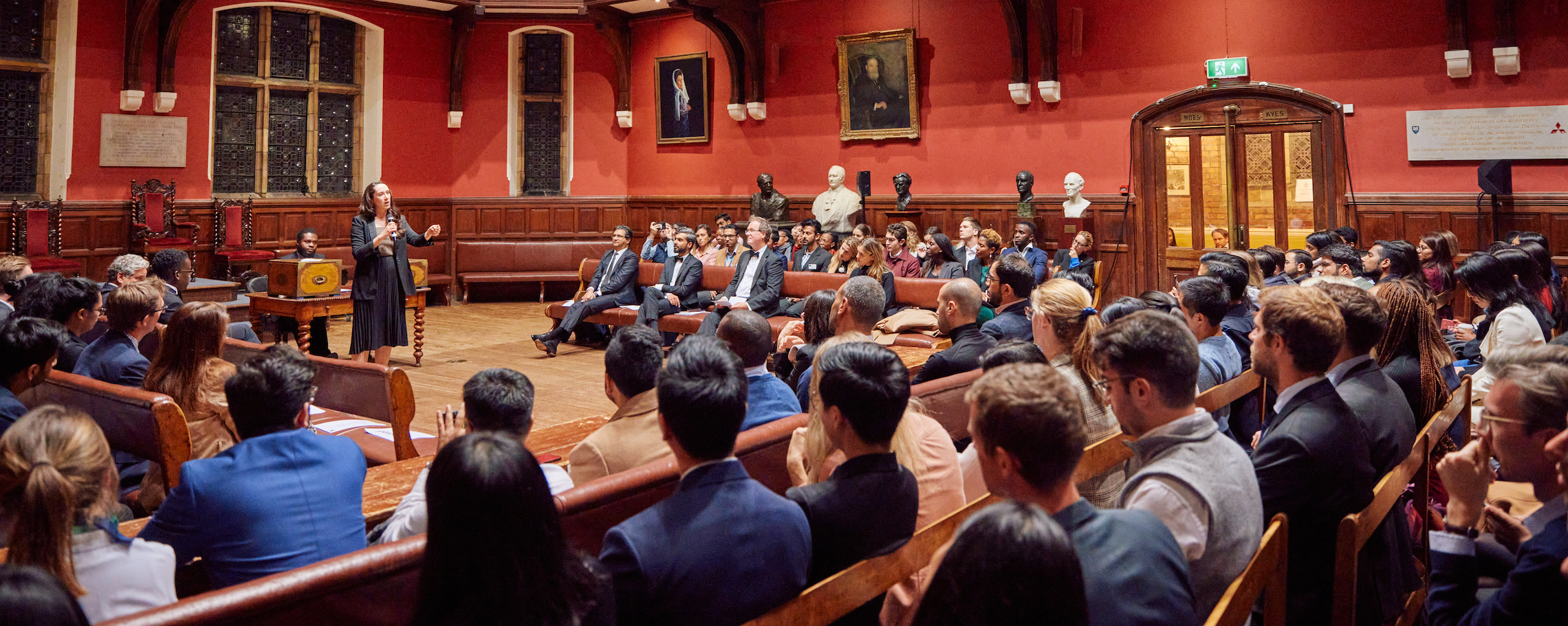 Inside a full Oxford Union debating chamber
