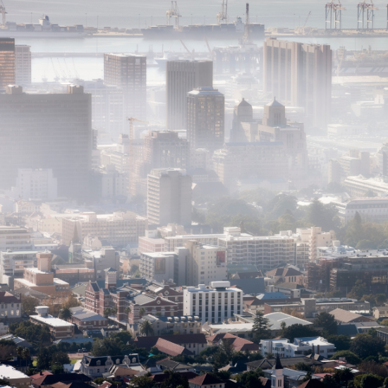 Visible misty air pollution above a city skyline