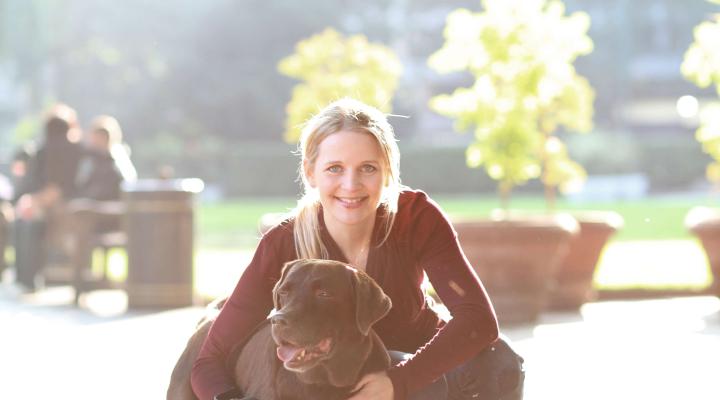 Rikke Rusenlund, founder of Borrow My Doggy with her dog