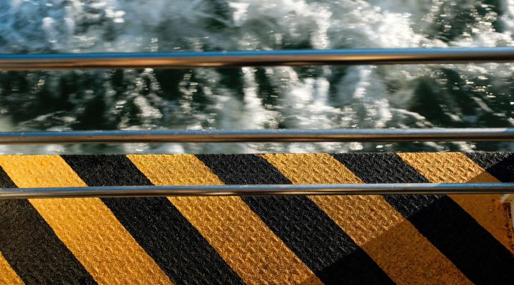 Warning stripes and guardrail (Photo by Florian Rieder on Unsplash)